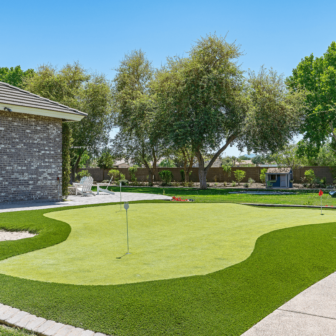 Putting green installation with surrounding pavers