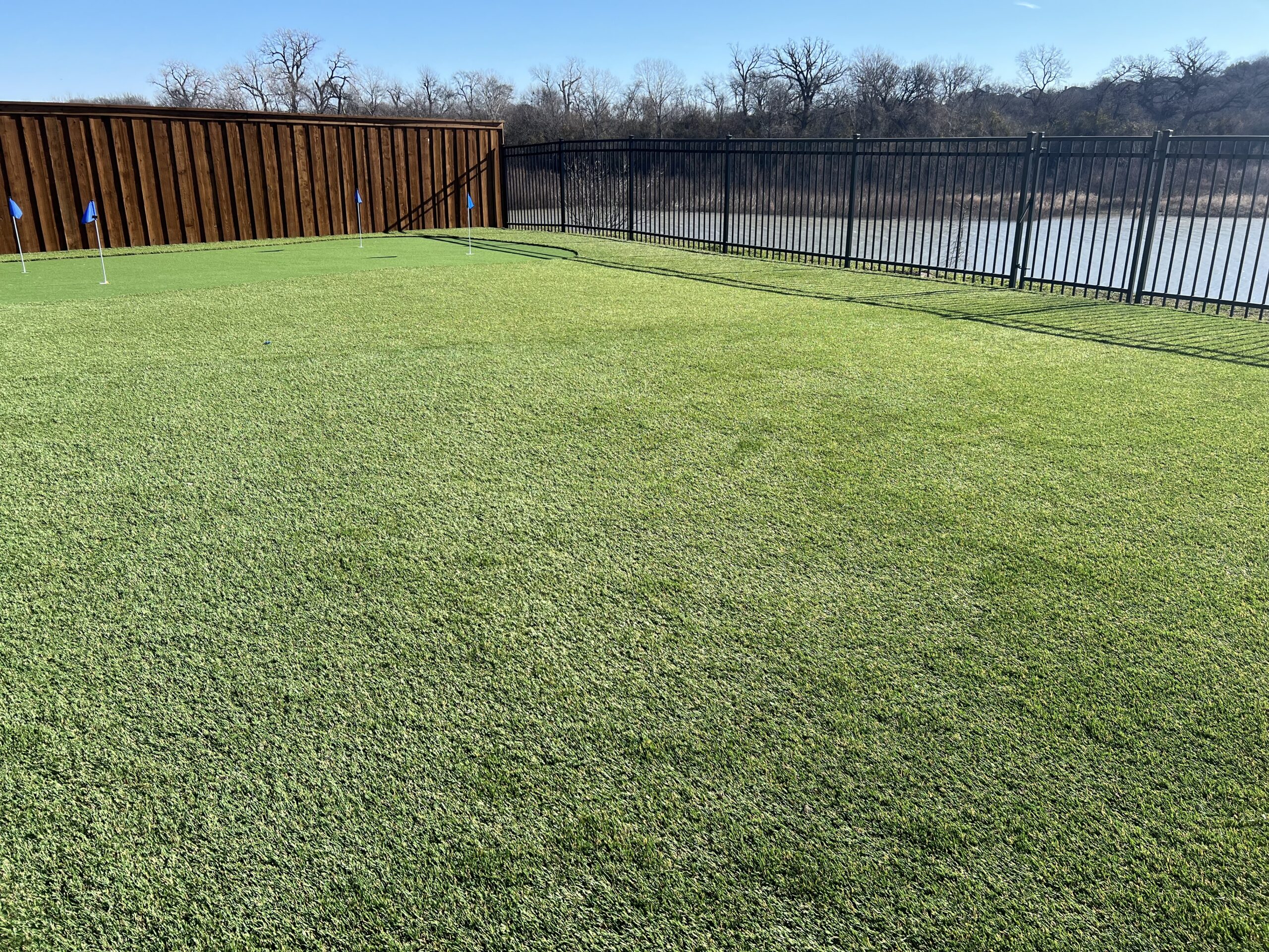 Completed artificial turf installation by Green Forever Turf on a residential property
