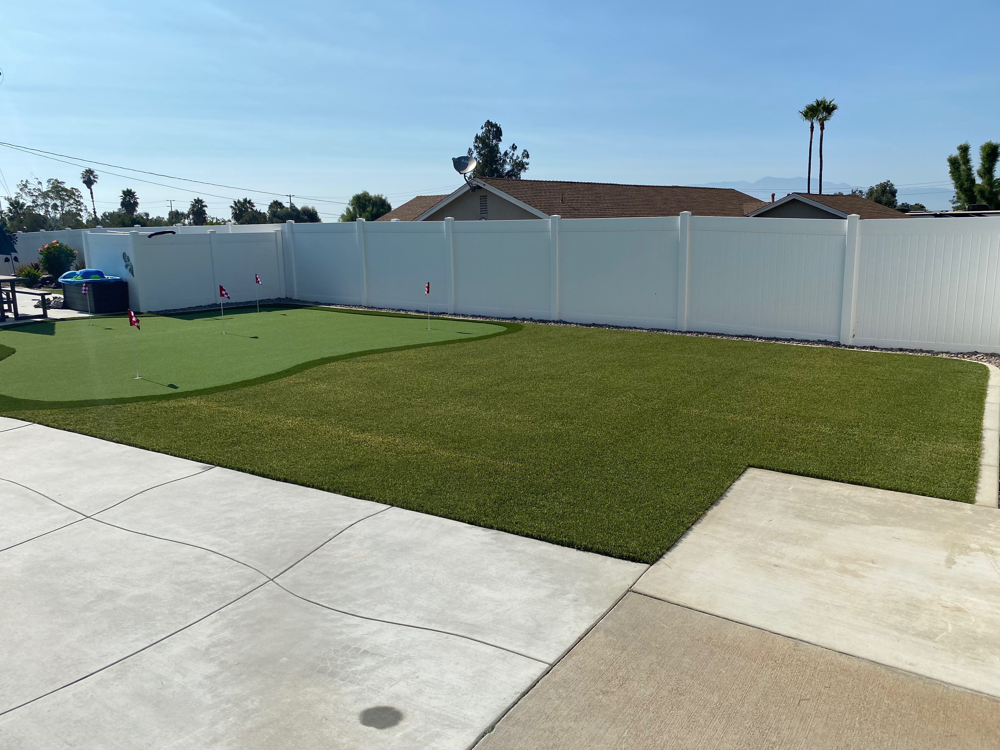 After — finished backyard putting green and artificial turf install by Green Forever Turf Texas
