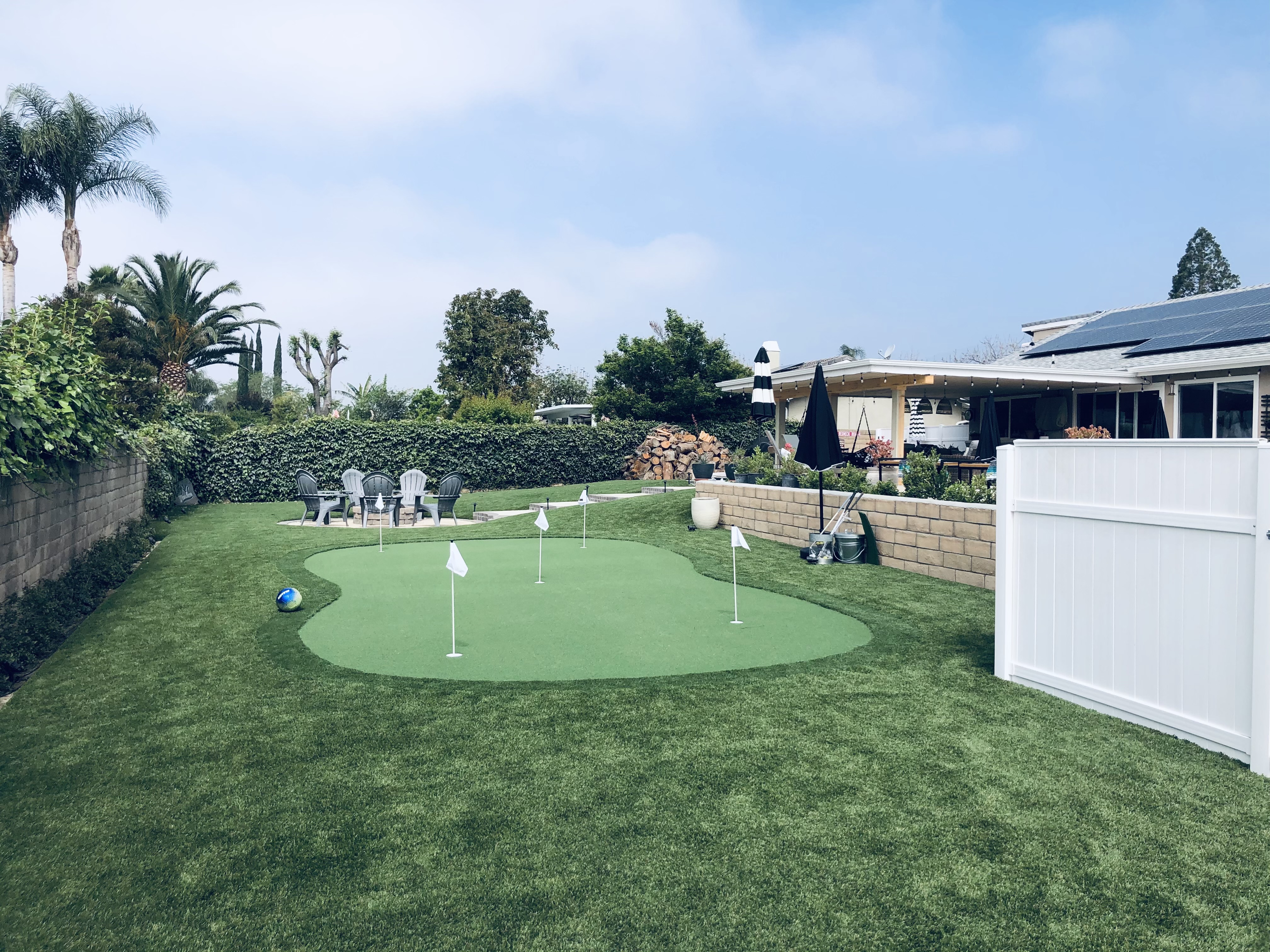 Backyard putting green with contoured break and tour-quality turf - Green Forever Turf Texas