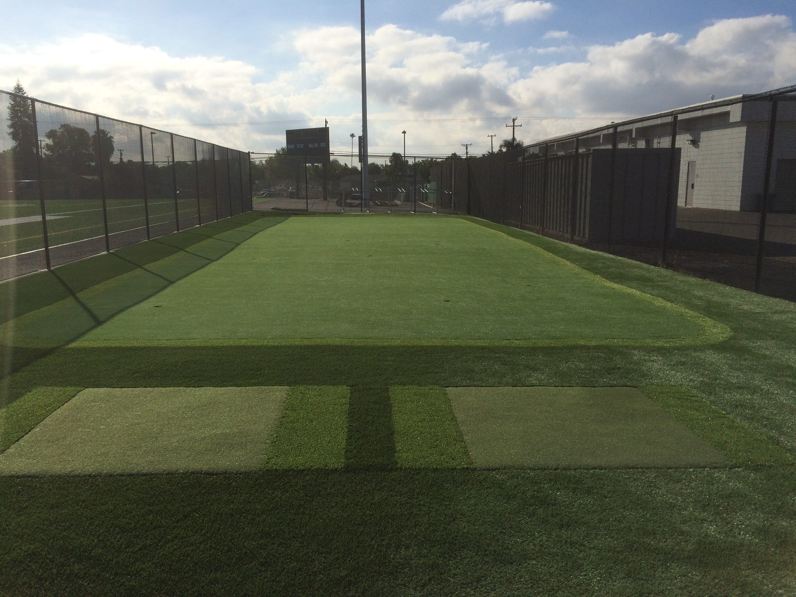 Commercial golf driving range with artificial turf tee mats - Green Forever Turf Texas