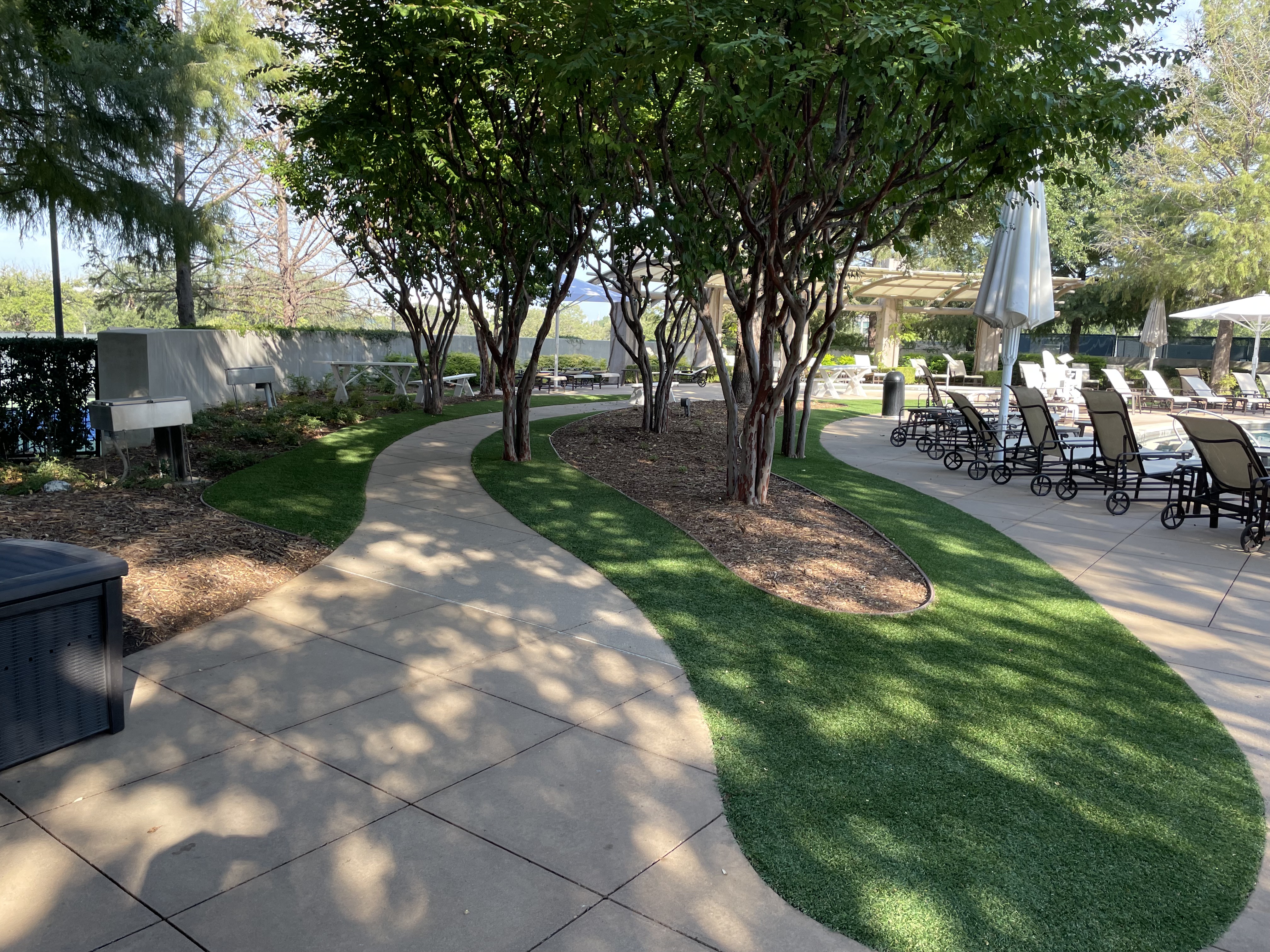 Poolside patio turf installation