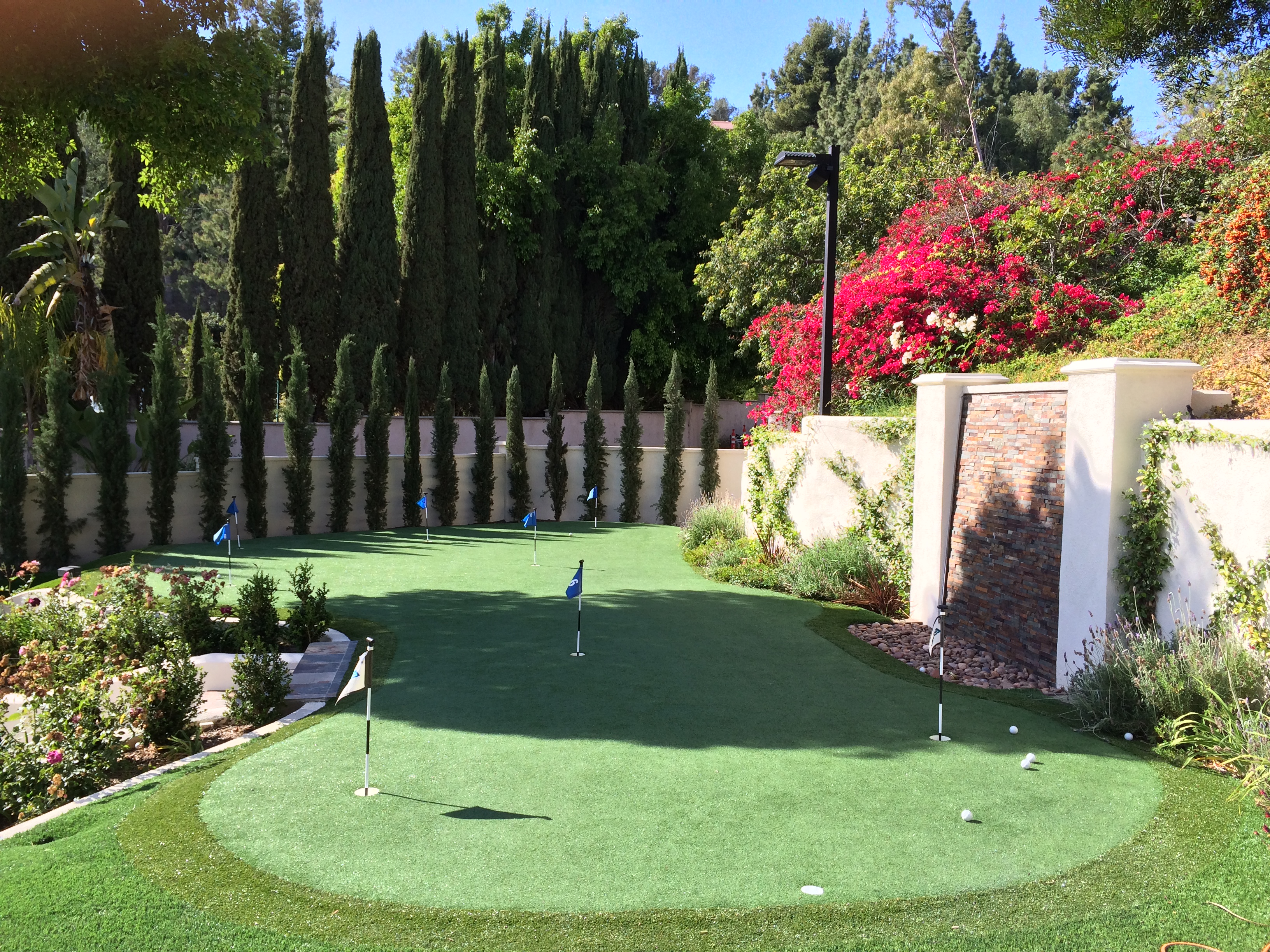 Putting green luxury backyard install - Green Forever Turf Texas