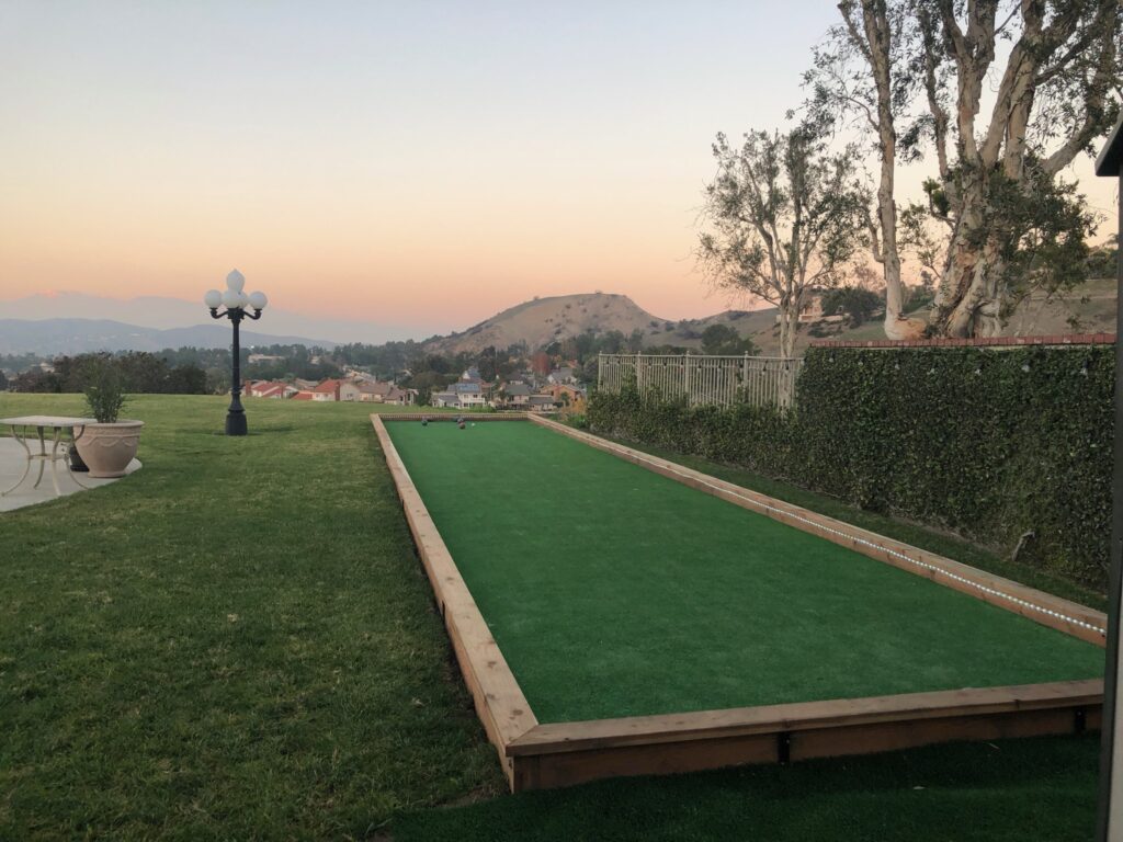 North Texas backyard with artificial turf replacing natural grass