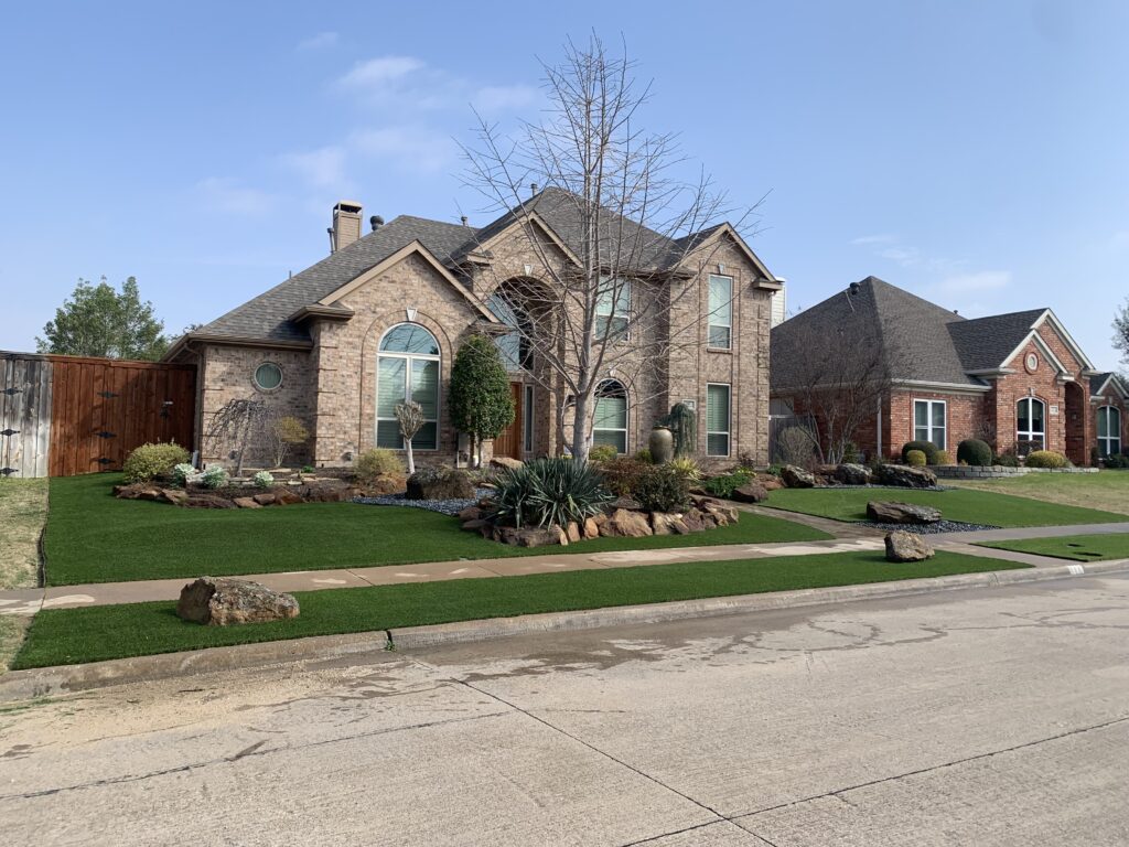 Front yard artificial turf blending seamlessly with landscaping