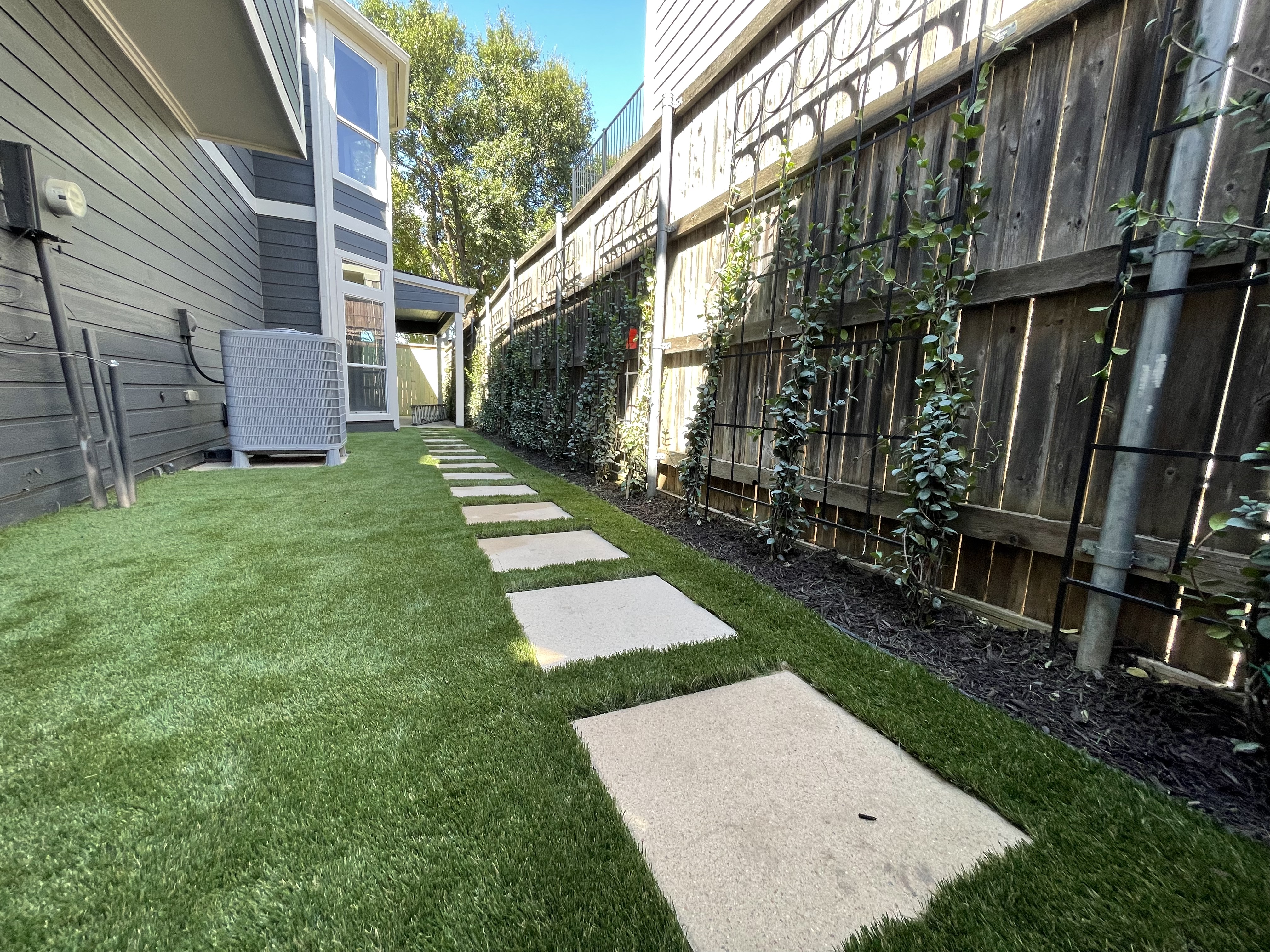 Side yard turf with stepping stones