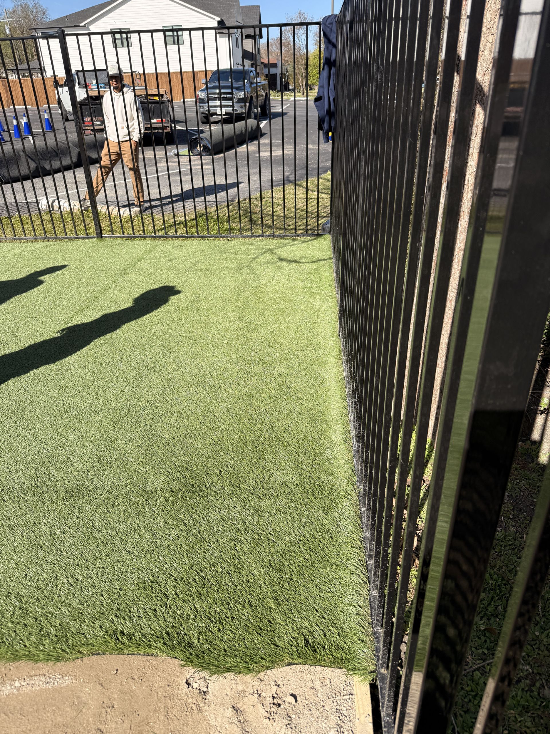 Wide view of a commercial synthetic turf field installation