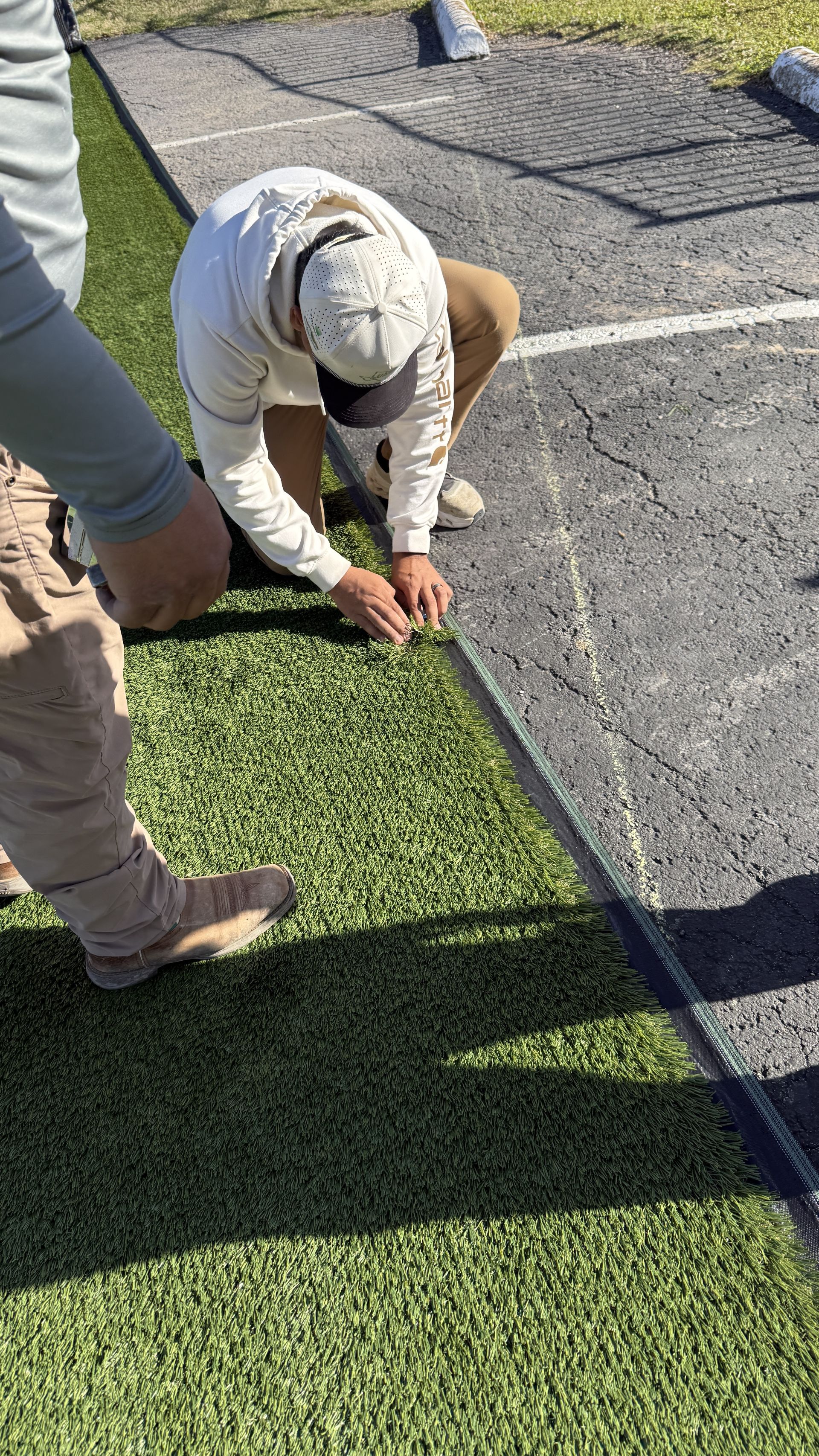 Turf field installation in progress